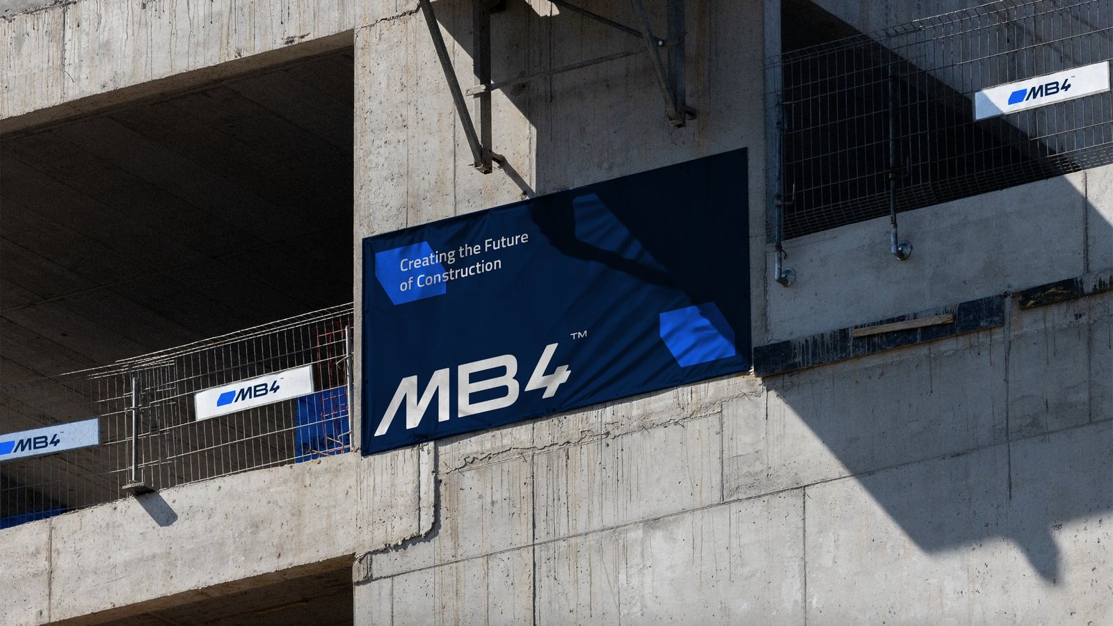 MB4 Contracting: Logo, visual system and a ready-to-use brand kit for MB4 Contracting, a Dubai building contractor, from site hoardings to letterhead templates.