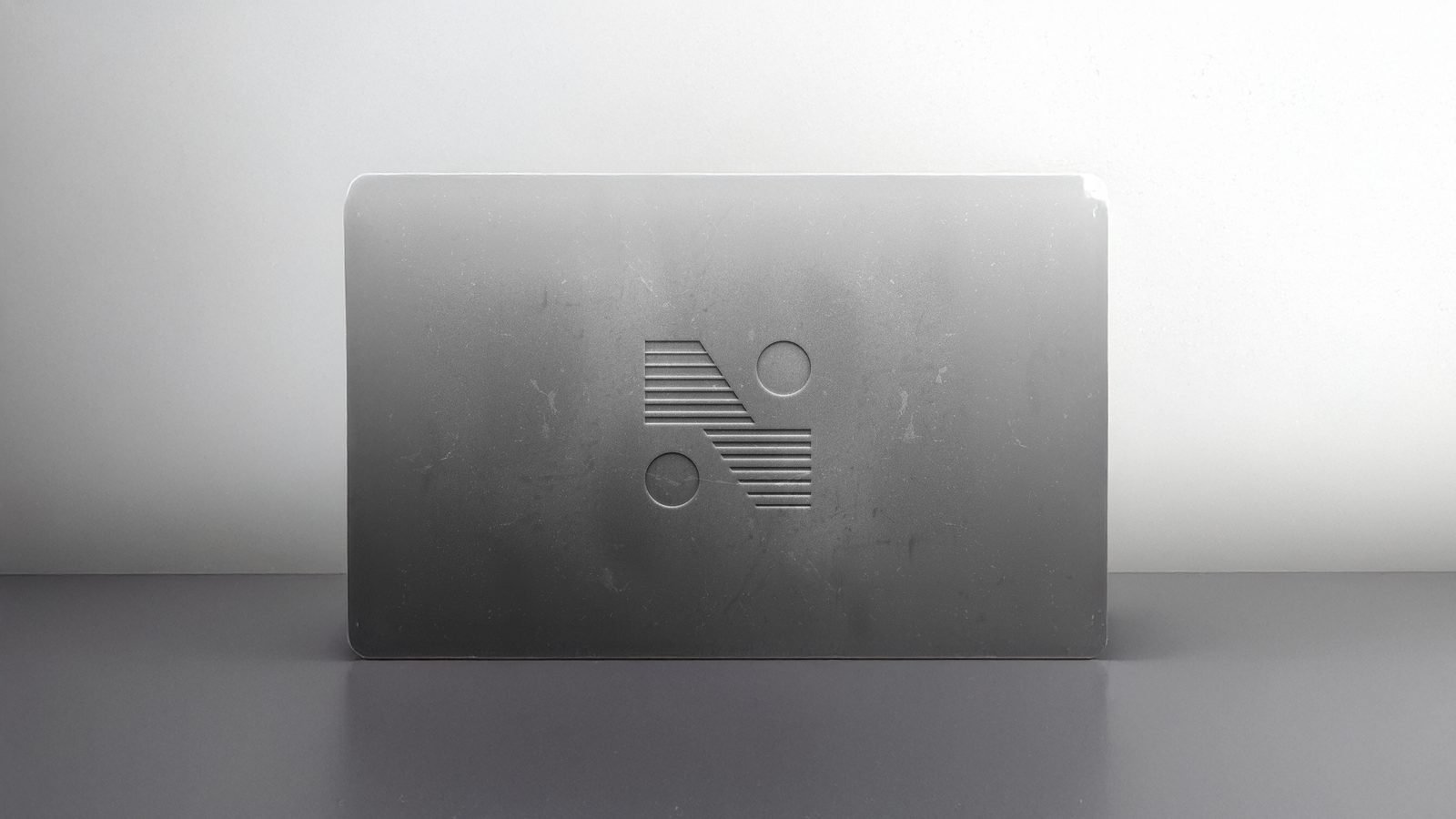 Neo Print Studio: Emblem carved into a stone block
