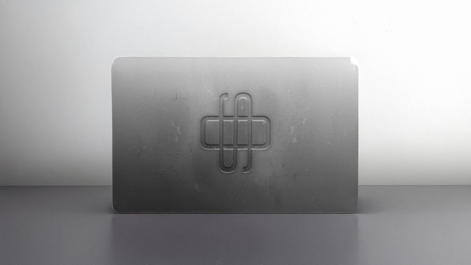 Speed Orbit: Emblem carved into a stone block